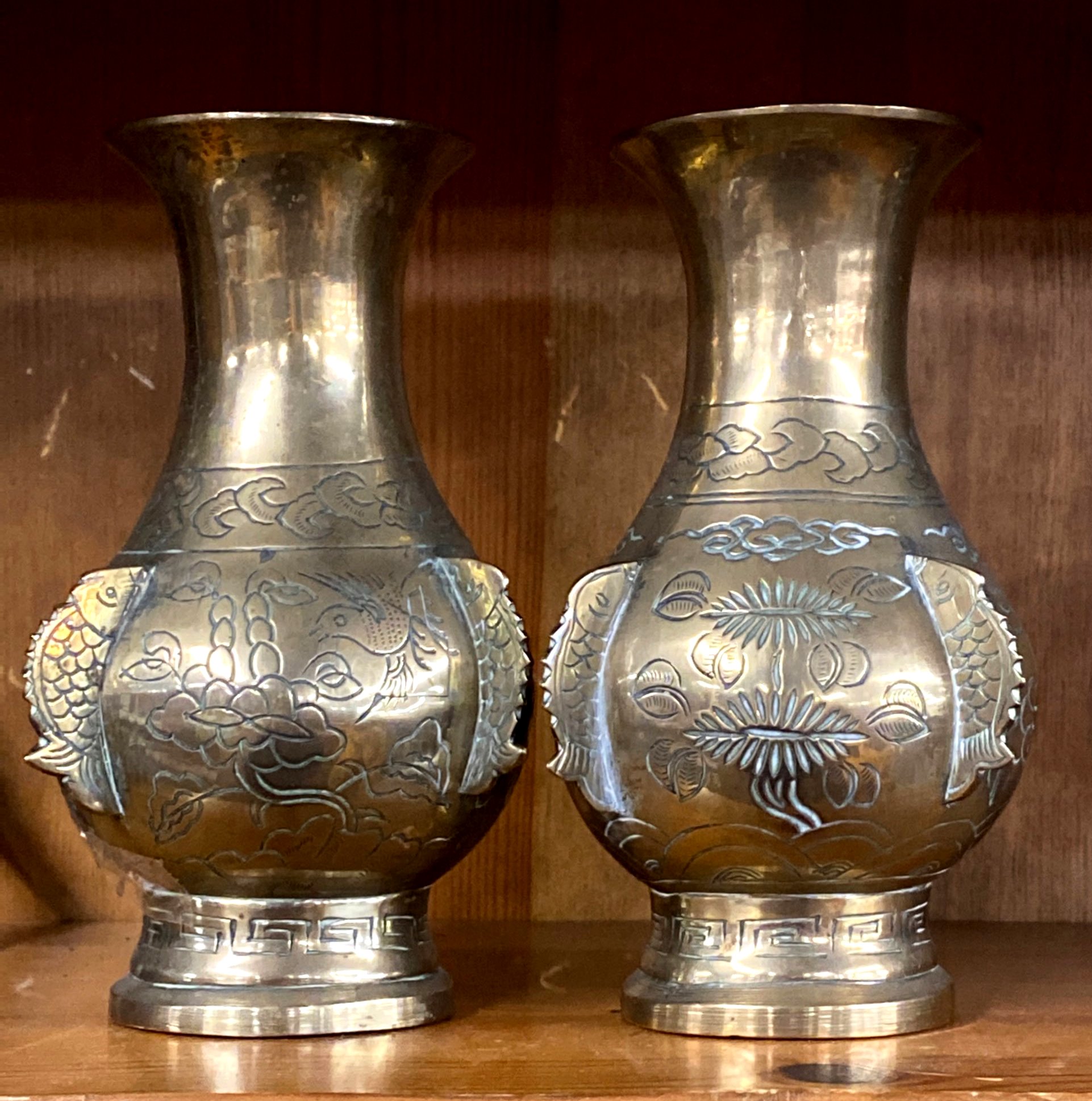 A pair of early 20th century Chinese bronze/brass vases, H. 18cm.