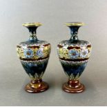 A pair of Royal Doulton stoneware vases, H. 18cm.