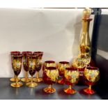 A Venetian glass decanter and liqueur glasses.