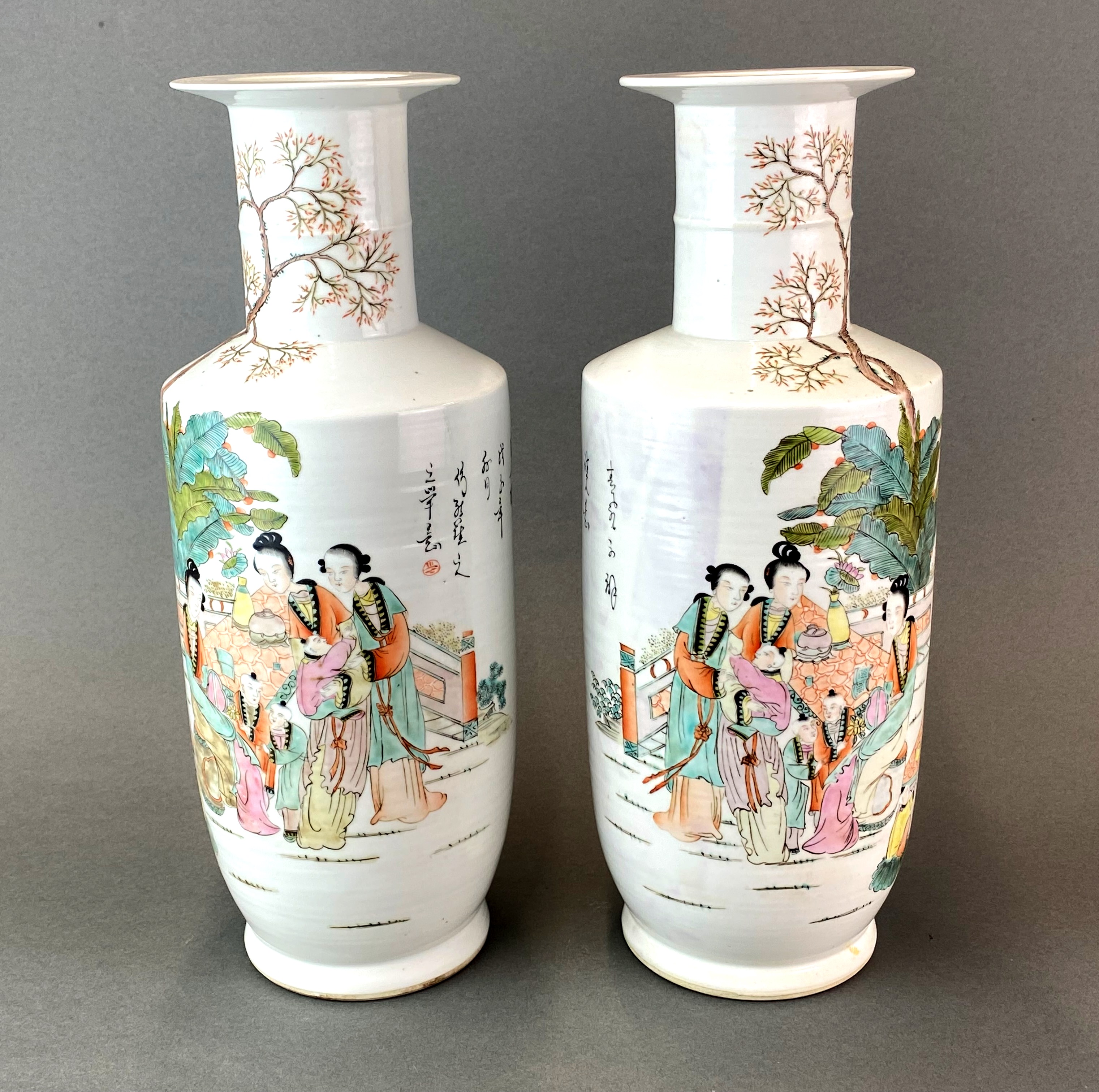 A pair of Chinese hand enamelled porcelain vases, H. 41cm.
