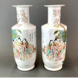 A pair of Chinese hand enamelled porcelain vases, H. 41cm.