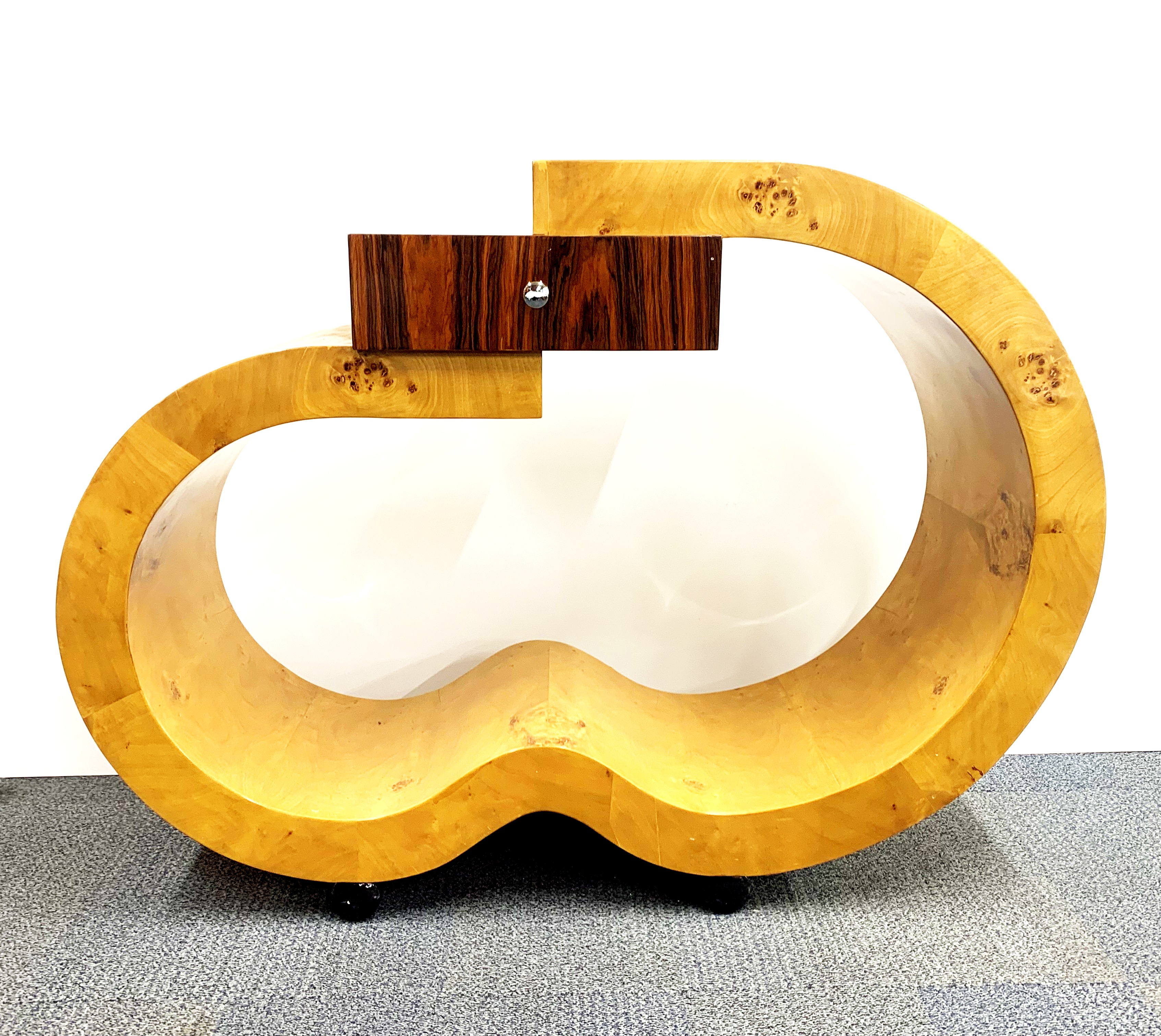 An unusual Art Deco style walnut veneered side table, W. 120cm. H. 90cm. - Image 2 of 4