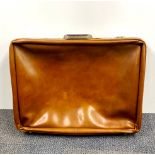 A 1970's expandable suitcase, 69 x 55cm.