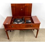 A Garrard record turntable in mahogany veneered case with a Toshiba radio amplifier and casette