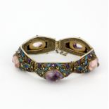 A Chinese filigree silver and enamelled amethyst and rose quartz set bracelet, 19cm.