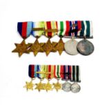 A group of medals with miniatures.
