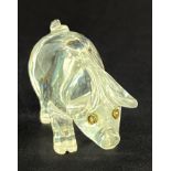 A cased carved rock crystal figure of a pig with diamond eyes, pig L. 5cm.
