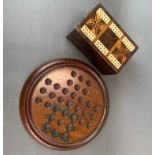 An inlaid rosewood card box and cribbage scorer, 16 x 10 x 8cm. with a mahogany solitaire board.