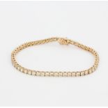 An 18ct rose gold line bracelet set with brilliant cut diamonds, approx. 6.25ct total, L. 19cm.