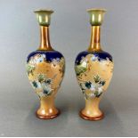 A pair of Doulton Slater stoneware vases, H. 29cm. One A/F to rim.