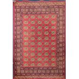 A vintage red ground rug, 155 x 130cm.