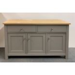 A contemporary painted finish cabinet, W. 137cm, H. 79cm.
