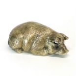 A Russian .88 silver model of a pig with cabochon ruby eyes, L. 6.5cm.