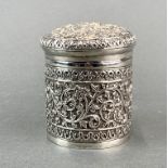 An Eastern hammered white metal (tested silver) box, H. 9cm. Dia. 7cm.