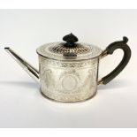 A Victorian hallmarked silver teapot.