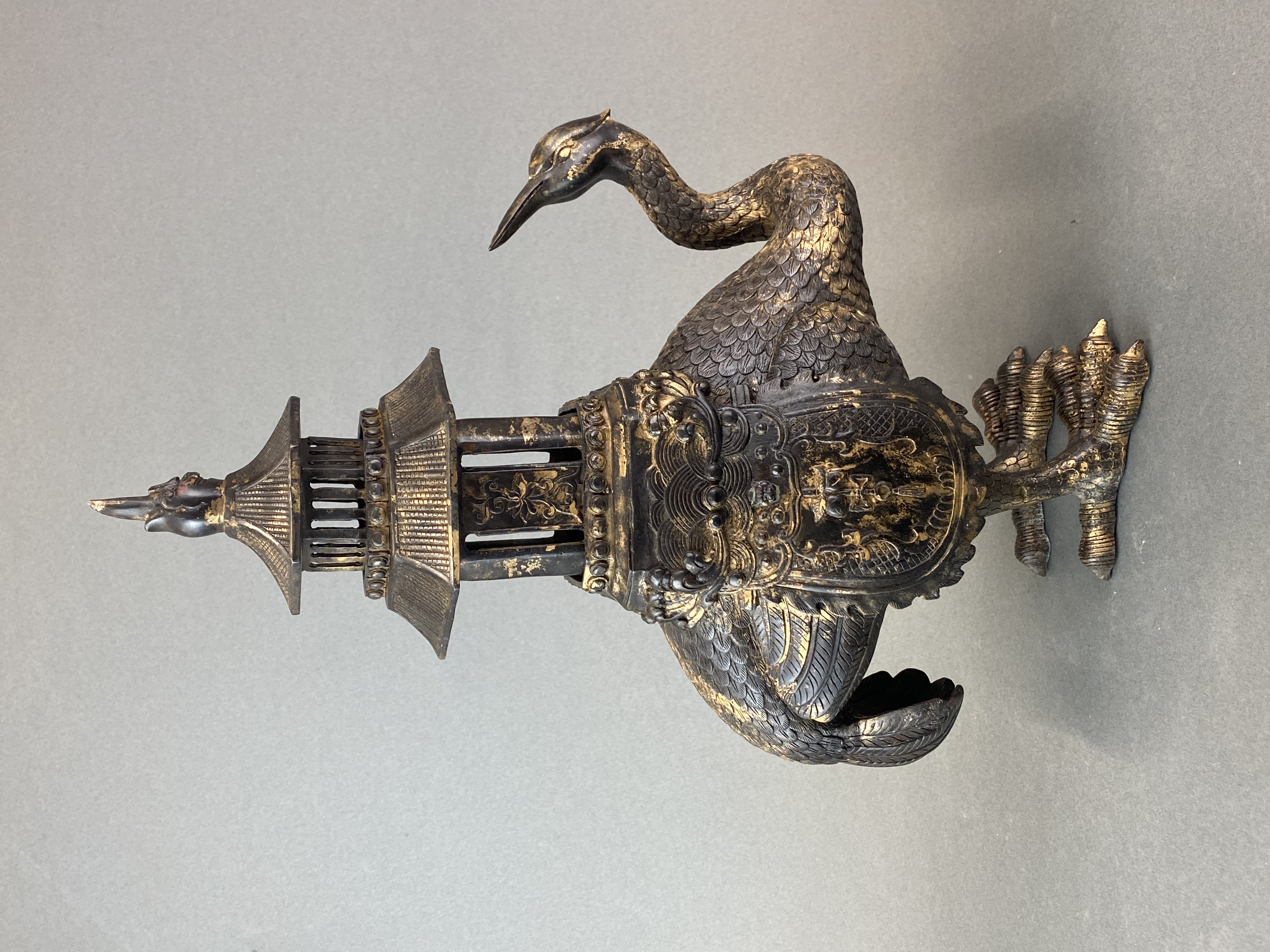 An Oriental gilt bronze censer in the form of a crane with a pagoda on its back, H. 46cm. - Image 3 of 3