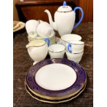 A 1970's Wedgwood coffee set with a small group of blue and white plates.