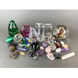 A group of glass paperweights including Caithness with a group of mixed minerals.