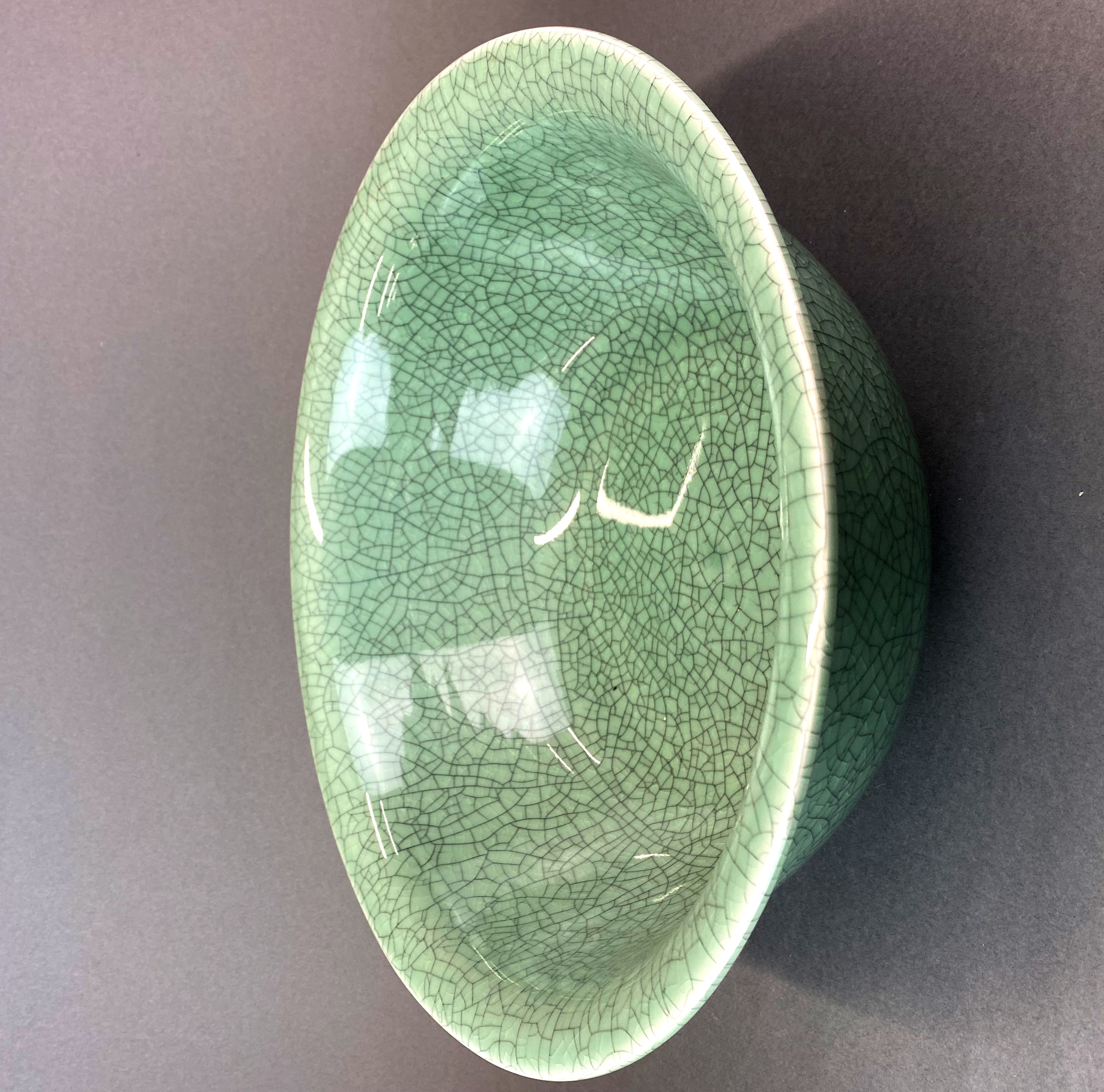 A large Chinese green crackle glazed bowl, Dia. 37cm. H. 15cm.