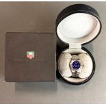 A lady's navy blue dial Tag Heuer stainless steal wristwatch with box, case W. 3cm.