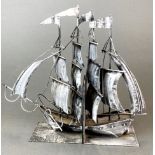 A pair of handmade metal galleon book ends, H. 27cm.