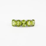 A 925 silver ring set with oval cut peridot, approx. 4.07ct total, (P).With certificate.