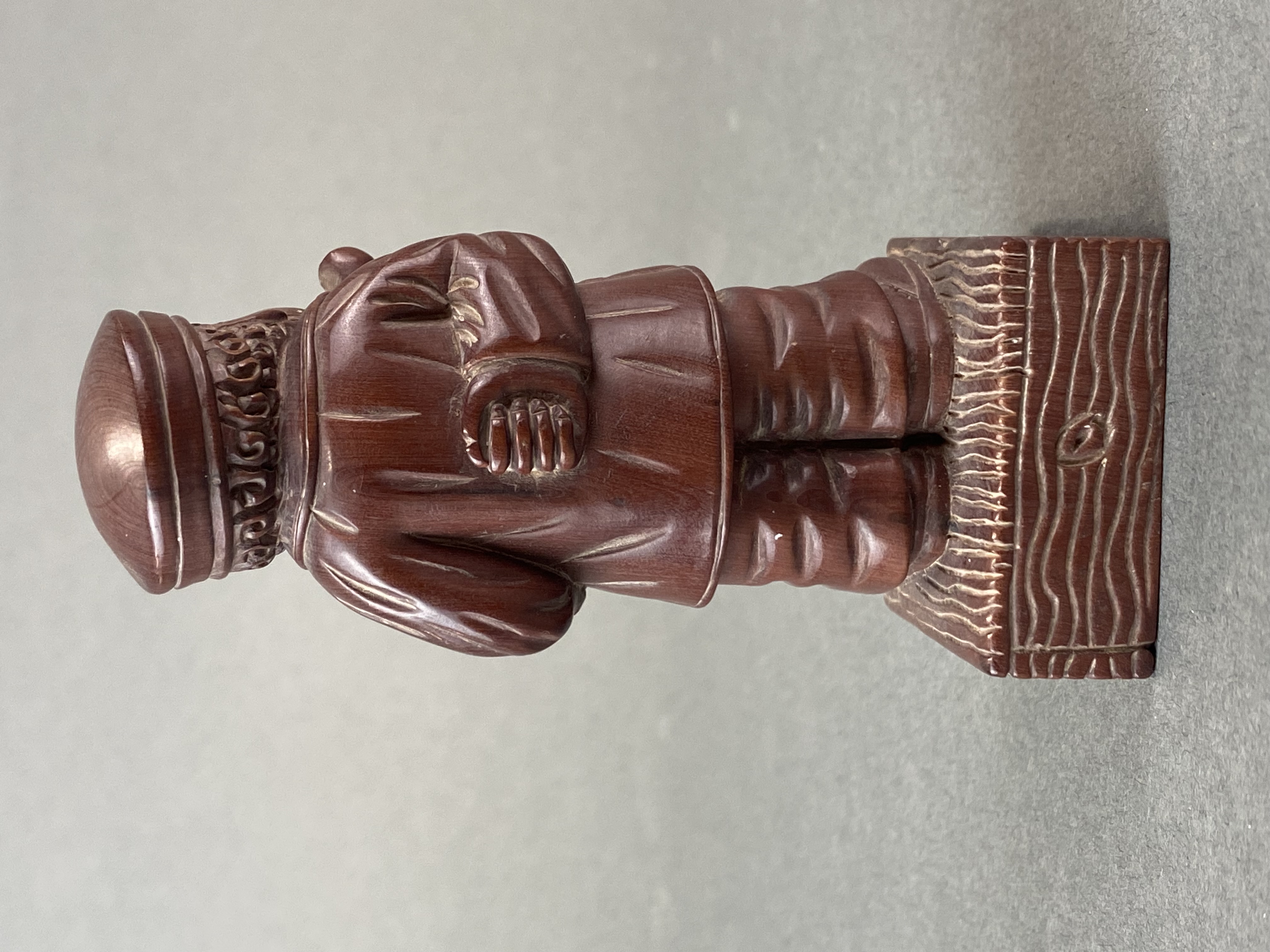 A carved fruitwood figure of a bearded gentleman smoking a pipe, H. 10cm. - Image 3 of 4