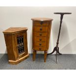 A circular six drawer chest, dia. 41cm, H. 86cm, together with a hardwood and iron corner cabinet