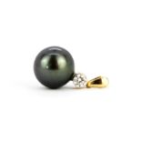 A yellow metal (tested high carat gold) pendant set with a large Tahitian pearl and brilliant cut