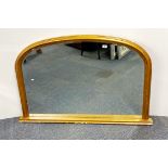 A gilt framed over mantle mirror, W. 127cm. H. 85cm.