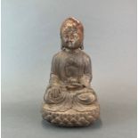 A Chinese gilt cast iron figure of a seated Buddha, H. 33cm.