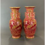 A rare pair of mid 19th century (c. 1860) English ironstone vases in a Chinese gilt relief design,