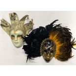 Two Venetian masks.