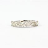 An 18ct white gold half eternity ring set with brilliant cut diamonds, approx. 2.17ct total, (N.5).