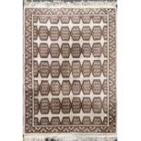 A large contemporary beige ground heavy quality wool rug, 299 x 186 cm.