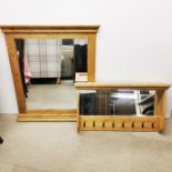 A heavy light oak mirror together with a matching mirror backed light oak hat/coat wall mount,