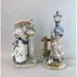 Two Lladro figurines of children, (minor damage to the flower petals, umbrella appears to be