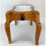 An 18th century French Rouen Faience bidet in a carved walnut stand, stand size 53 x 35 x 37cm.