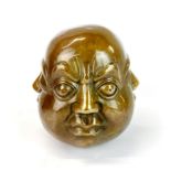 A bronze four faced Buddha head, H. 11cm.