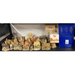 A quantity of Lilliput Lane and David Winter cottages.