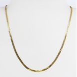 A 14ct yellow gold (stamped 14K) flat curb chain, L. 40cm.
