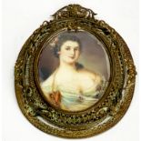 A gilt framed hand painted portrait miniature of a lady, frame size 10.5 x 13.5cm.