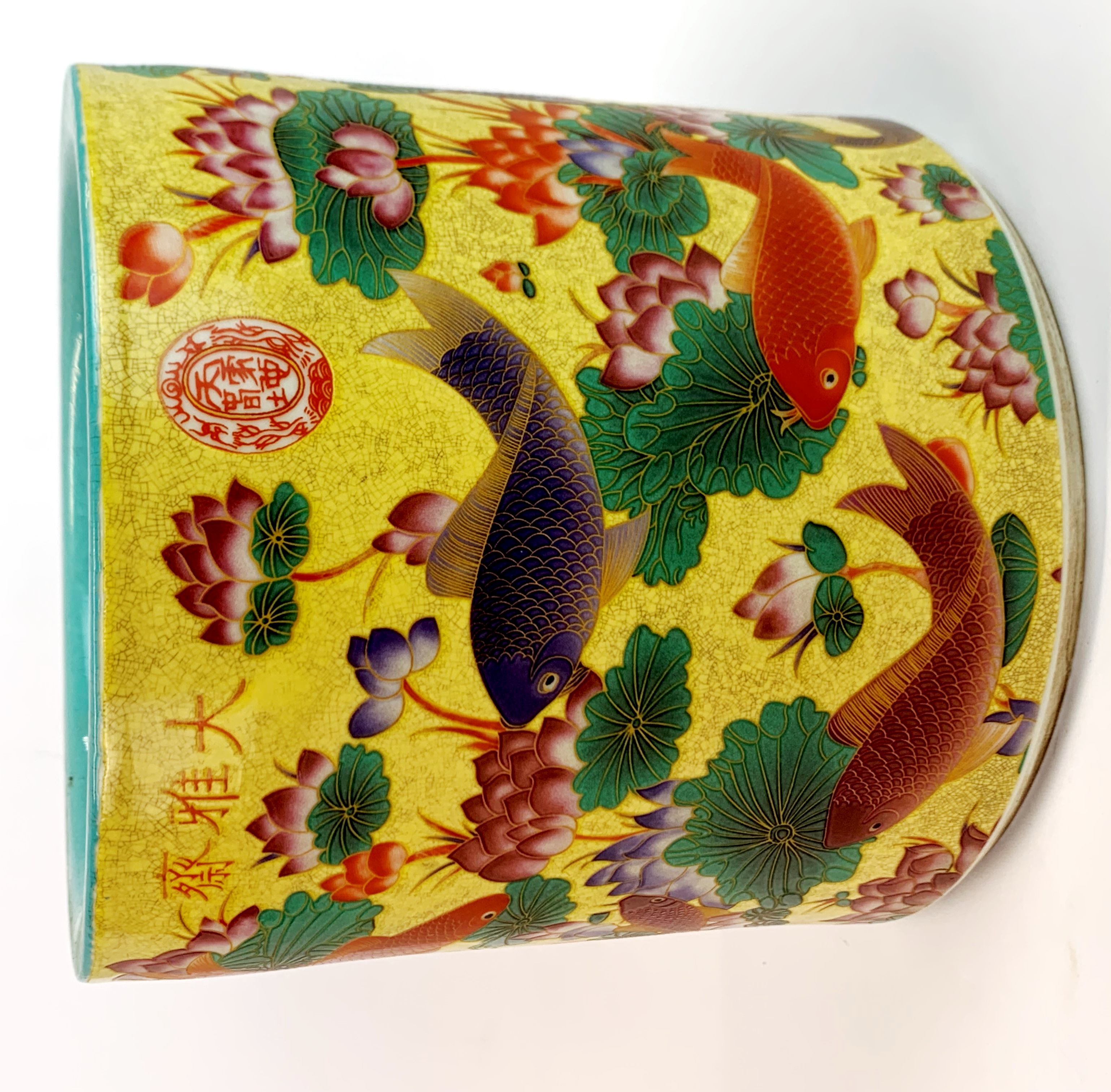 A Chinese yellow ground hand enamelled porcelain brush pot decorated with carp, H. 18.5cm, Dia.