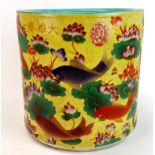 A Chinese yellow ground hand enamelled porcelain brush pot decorated with carp, H. 18.5cm, Dia.