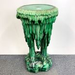 A large 19th century majolica plant stand, (some minor chips), H. 68cm, Dia. 38cm.