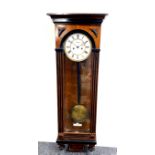 An mahogany veneered wall clock, H. 102cm.