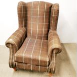 A heavy quality wing back armchair, H. 109cm.