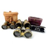 A quantity of antique binoculars and opera glasses.