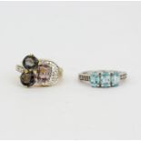 A Burmese multi colour spinel and diamond set 925 silver ring together with a blue zircon and
