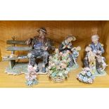 A Capodimonte porcelain figure of a tramp on a bench and five further porcelain items.